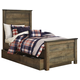 Trinell Twin Panel with Underbed Storage Bed in Warm Rustic Oak B446S-TWIN Trinell Twin Panel with Underbed Storage Bed in Warm Rustic Oak B446S-TWIN