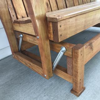Porch glider hardware top