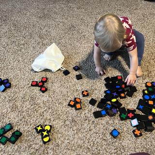 Lily loves to sort the blocks!