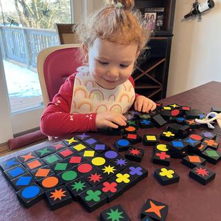 Em loves to organize the shapes and colors!