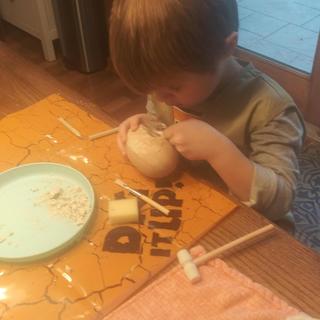 Working to get Dino out of Egg!