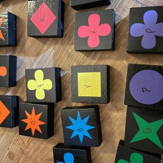Added letters to our tiles so that my colorblind sons could play much easier.