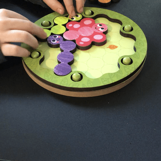 Playing Color Clue Caterpillars