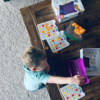 3 year old enjoying bingo