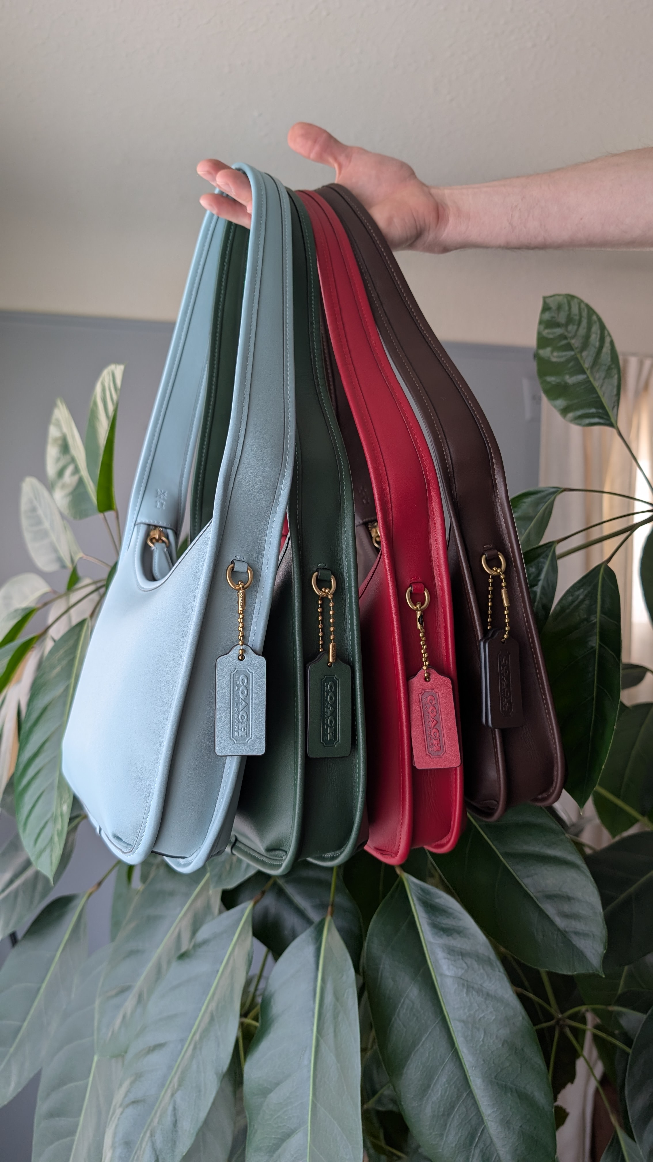 COACH® | Curve Zip Bag