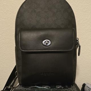 Turnlock Sling Pack In Signature Canvas | Bags | Coach | COACH® Turnlock Sling Pack In Signature Canvas | Bags | Coach | COACH®