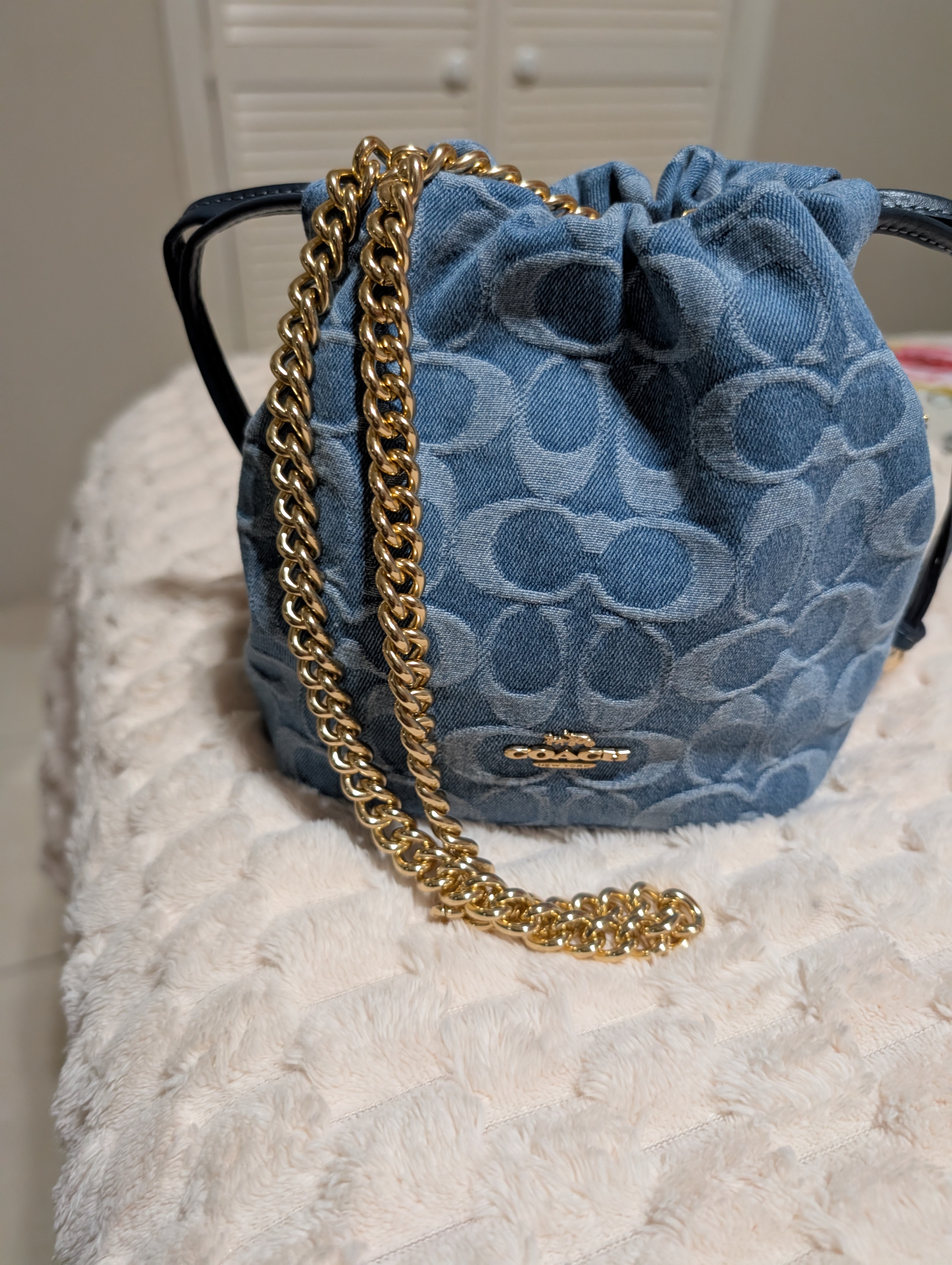 Faye Mini Drawstring Bag In Signature Jacquard With Floral