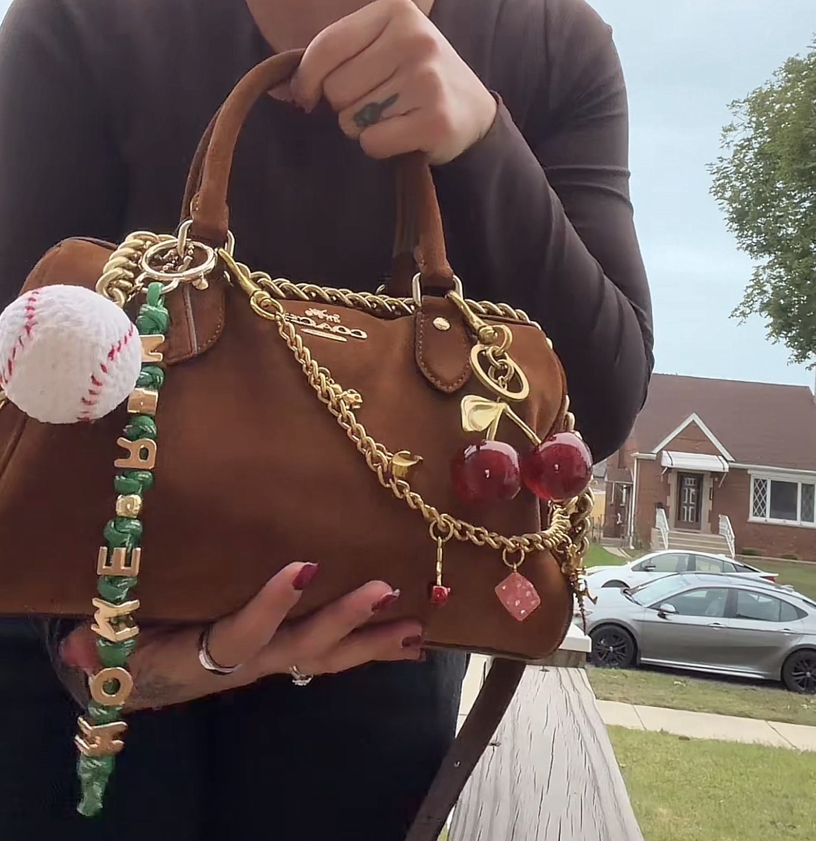 Rowan Satchel Bag In Signature Canvas With Charms | COACH®