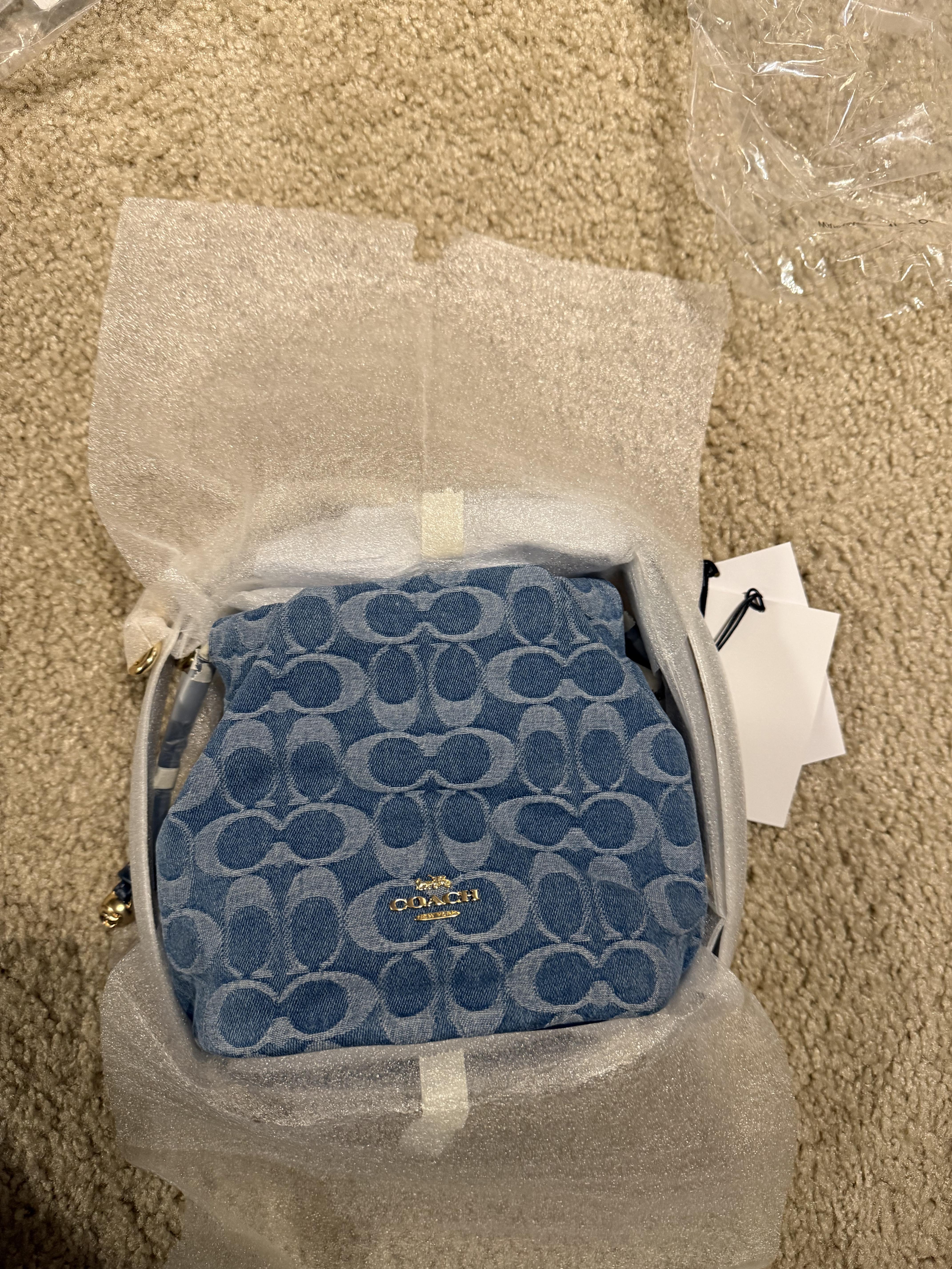 Faye Mini Drawstring Bag In Signature Jacquard With Floral