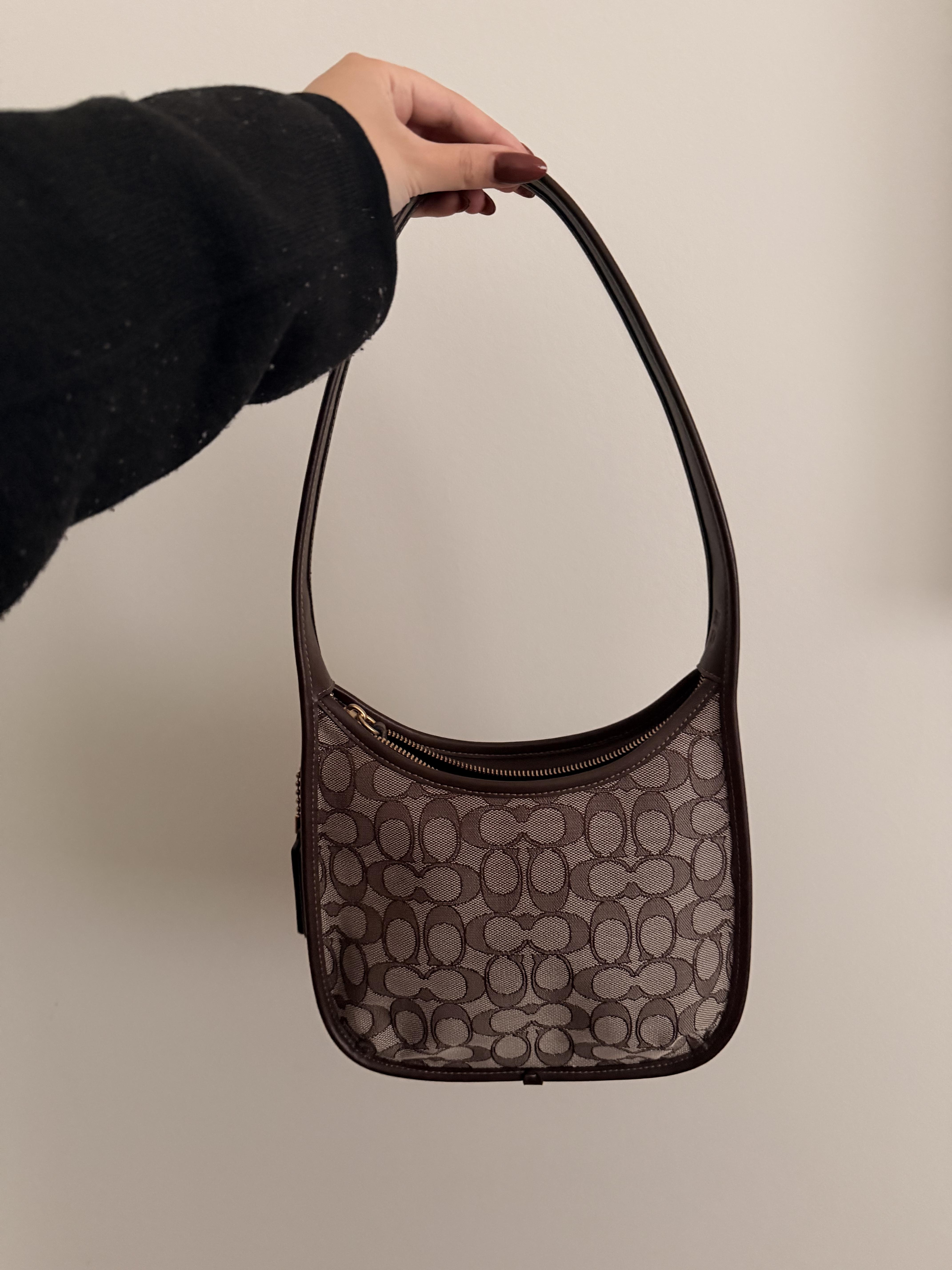 COACH® | Curve Zip Bag
