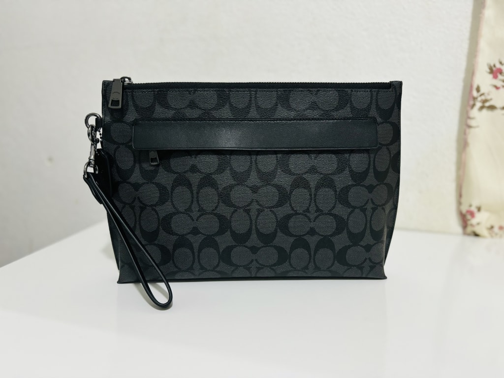 Carryall Pouch In Signature Canvas | COACH®