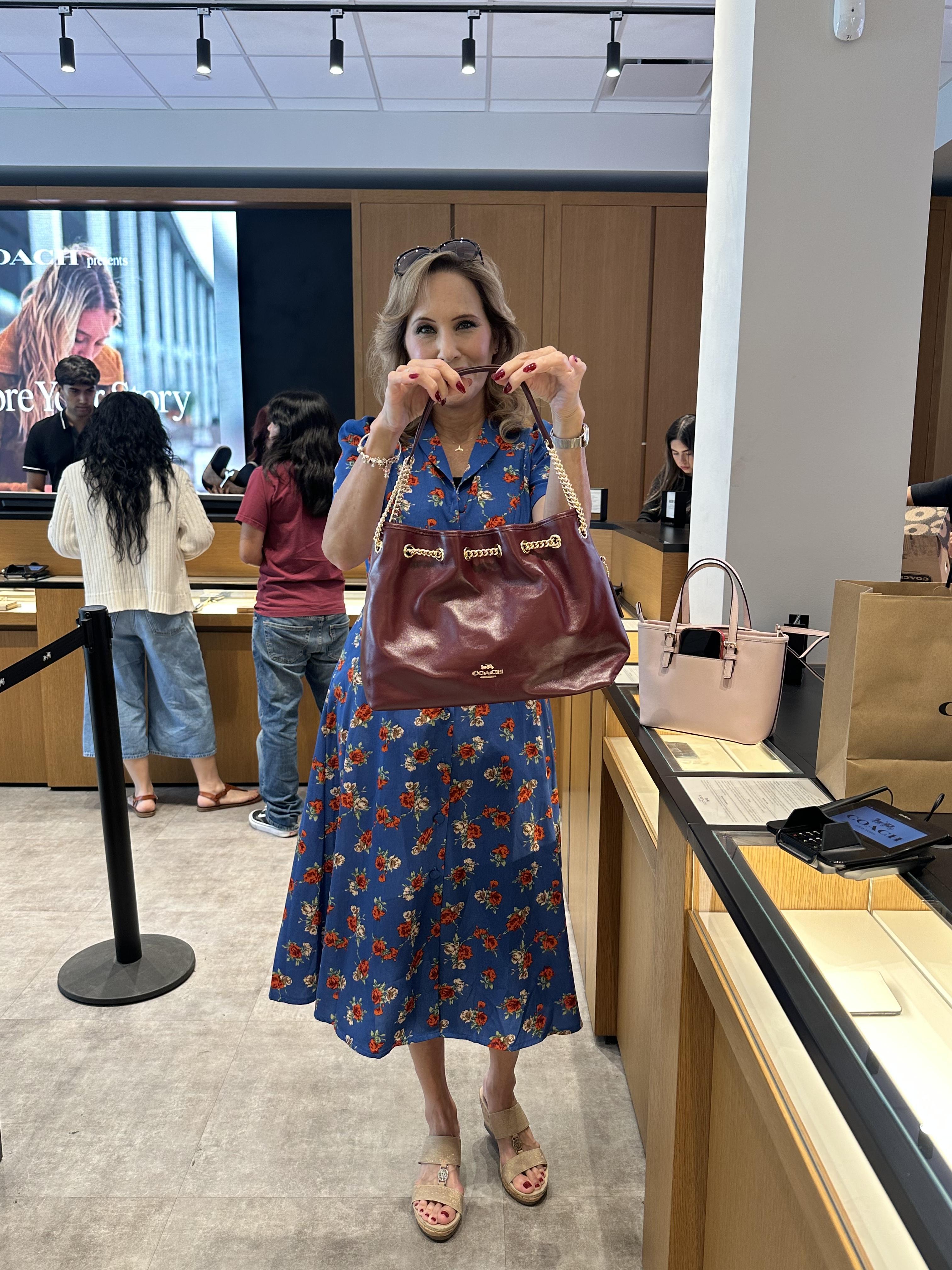 Evelyn Shoulder Bag In Loved Denim With Quilting And Charm | COACH®