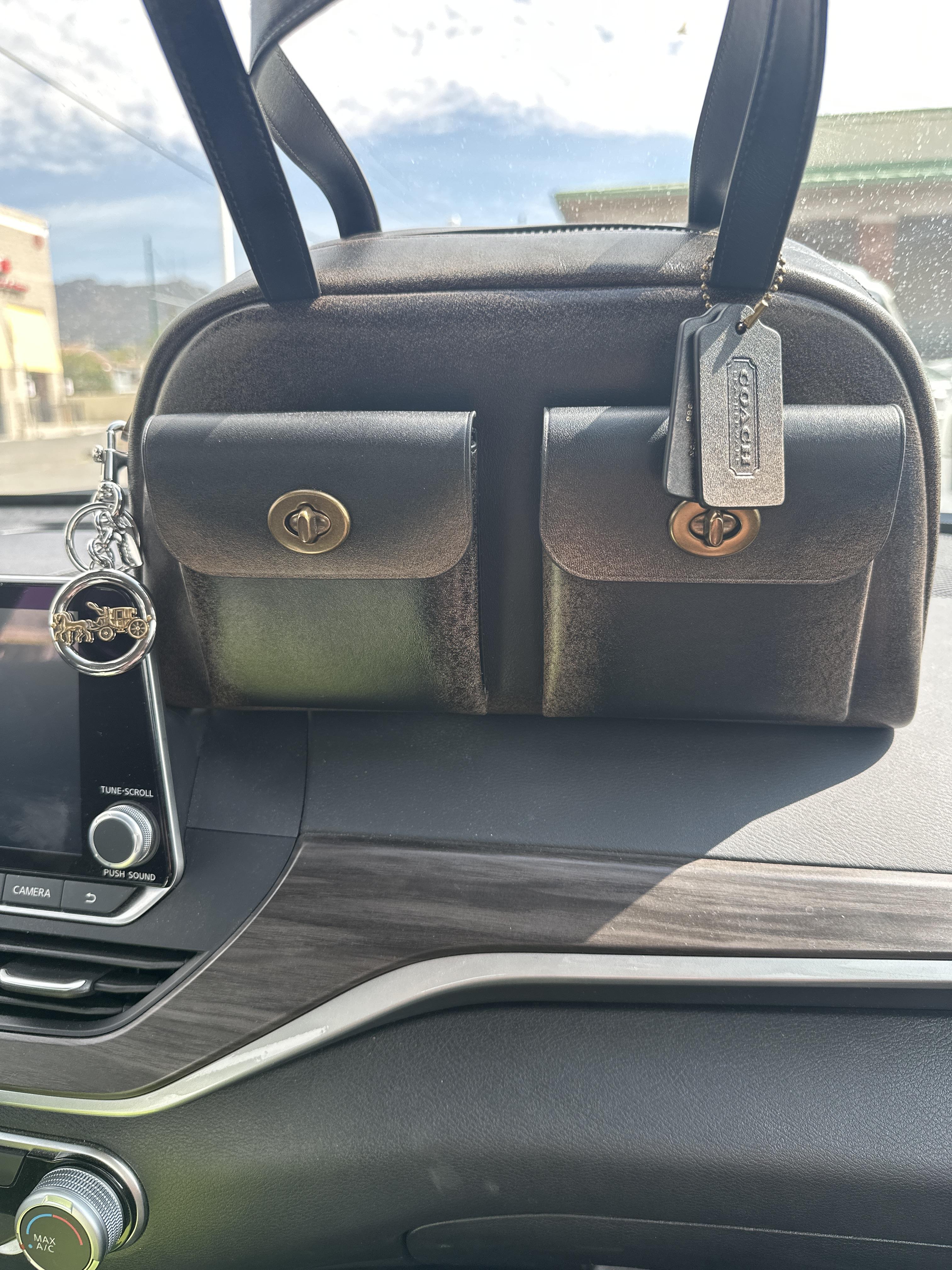 COACH® | Twin Turnlock Bag In Loved Leather