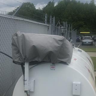 Cover on Heliport Jet A fuel tank.  Covers pump, meter, and filter.