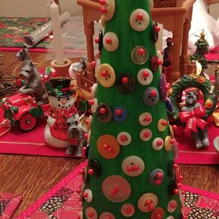 Painted cone and applied buttons