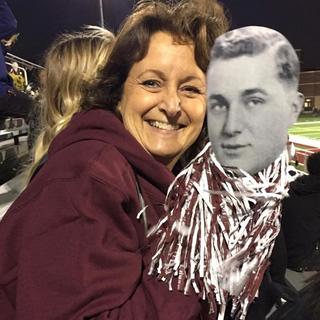 Sister Kim with fan paddle of our Dad.