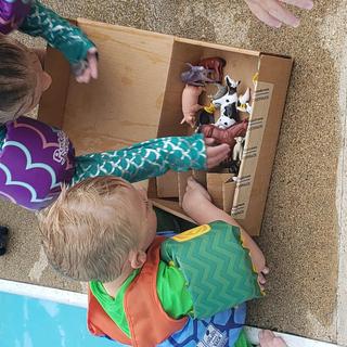 Grandkids looking at the animals