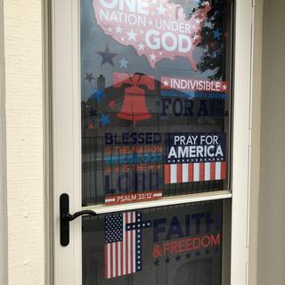 Front door with window clings