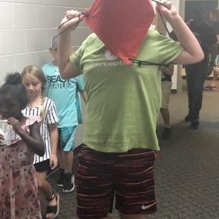 S.C. Strengthening Families: There is one is class clown in every group!! But he has his backpack!!