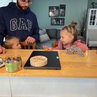 Teaching her little sis about Easter
