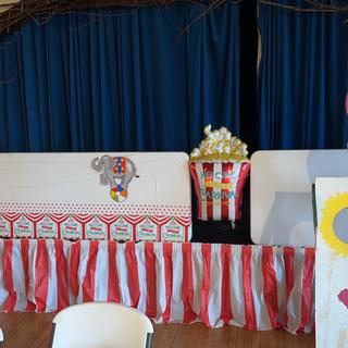 Placed a table skirt along the stage