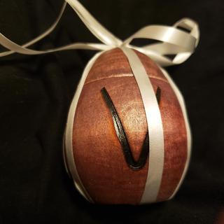 Wooden egg with ribbon