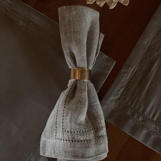 Napkin ring - it is silver in color - the picture is somewhat shaded and it gives a different look