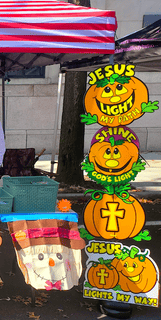 Pumpkin signs on the tent pole of our church's booth at the Town Country Fair