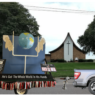 Inflatable globe on float