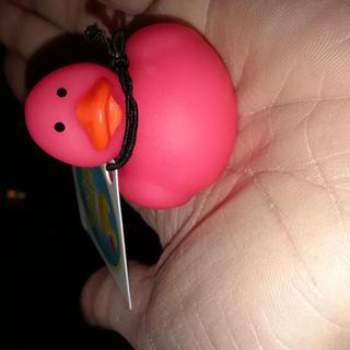 Close up of mini neon rubber duck