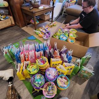 Filling over a hundred gift bags and baskets for neighborhood kids!