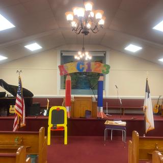 Our Decor also included the graduation sign yardstakes with scripture
