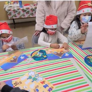 Children at church creating their Nativity scene