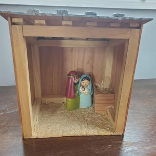 Mary, Joseph and Baby Jesus in one of the stables we made.