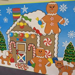 Gingerbread scene with many stickers in place.