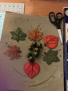 Fall leaves and acorns.