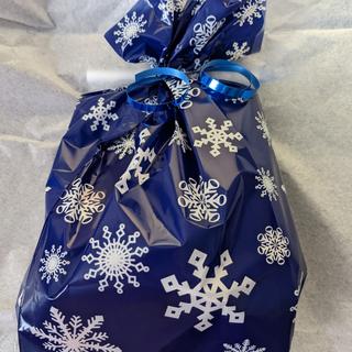 Bag filled with treats and tied with (self provided) ribbon