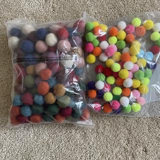 Pompoms on the left are the ones I got. Nice size nice and firm. However, the colors were drab.