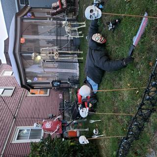 Skelly and Ten walking the dog and mowing the yard.  Normal daily chores.