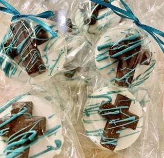Chocolate covered Oreos with crosses
