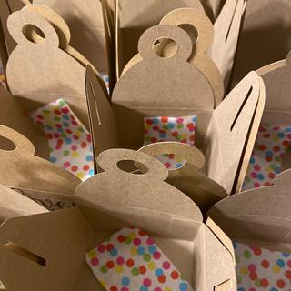 Place tissue paper inside to line the boxes