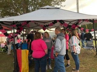 Notice the garland around the tent, just under the roof. 