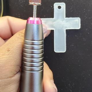 Used electric nail file to erase