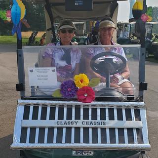 Golf cart decor with parrots