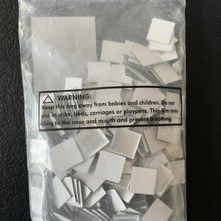 Bagged Mirror Tiles Close-up