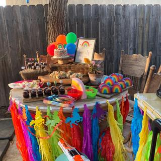 Rainbow fringe dessert table