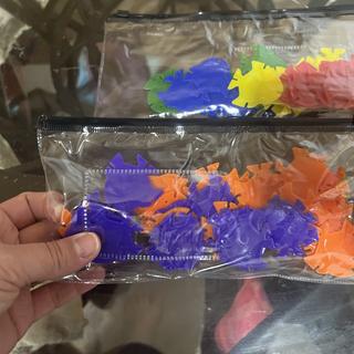 Orange and purple included but not mentioned or pictured in ad.
