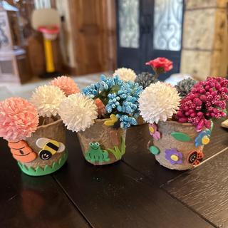 Cute flower pot crafts. We added candy inside and flowers