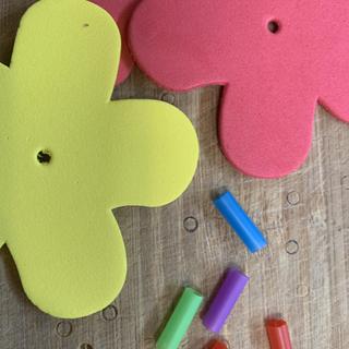 The straw pieces are too small to use a regular paper hole punch