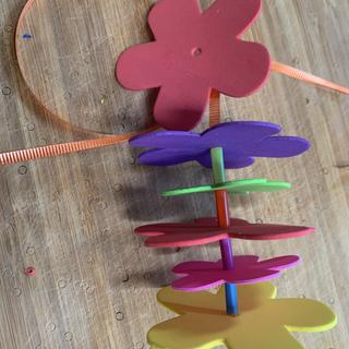 This size hole works with curling ribbon w/ the small straws in the kit